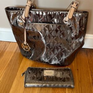Michael Kors silver metallic purse and wallet